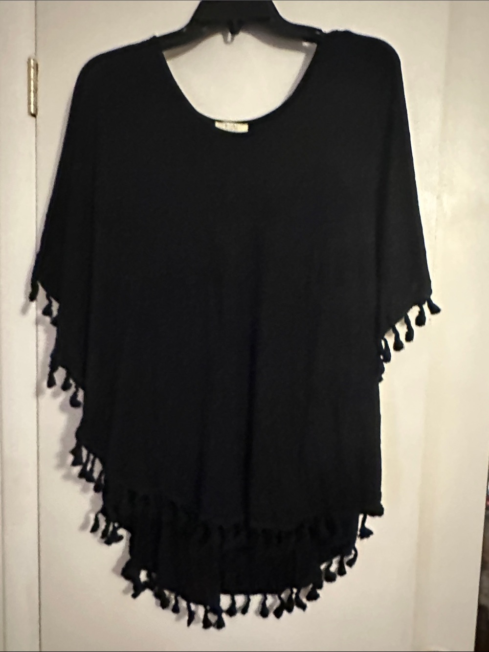 Kori Black Tassel-Hem Poncho Sweater